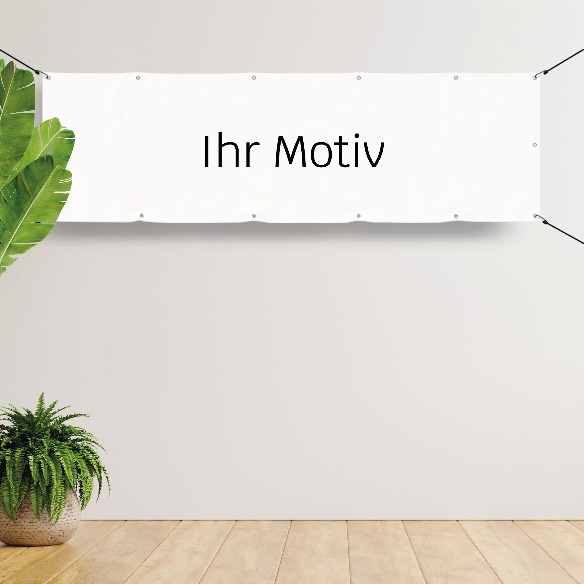 Individuelles Banner mit dem Schriftzug "Ihr Motiv" auf weißem Hintergrund, gespannt an einer Wand, bereit für die Personalisierung nach Wunsch.