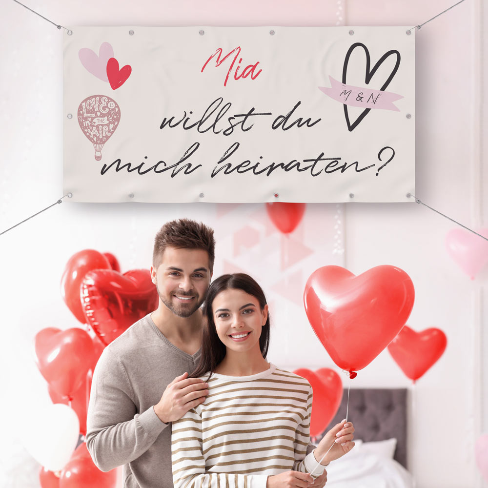 Antragsbanner "Love Rot" zum Personalisieren mit Namen, Beispielbild mit Pärchen und Herz-Luftballons