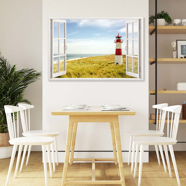 Leinwandbild Fensterblick "Strand mit Leuchtturm" über Esstisch