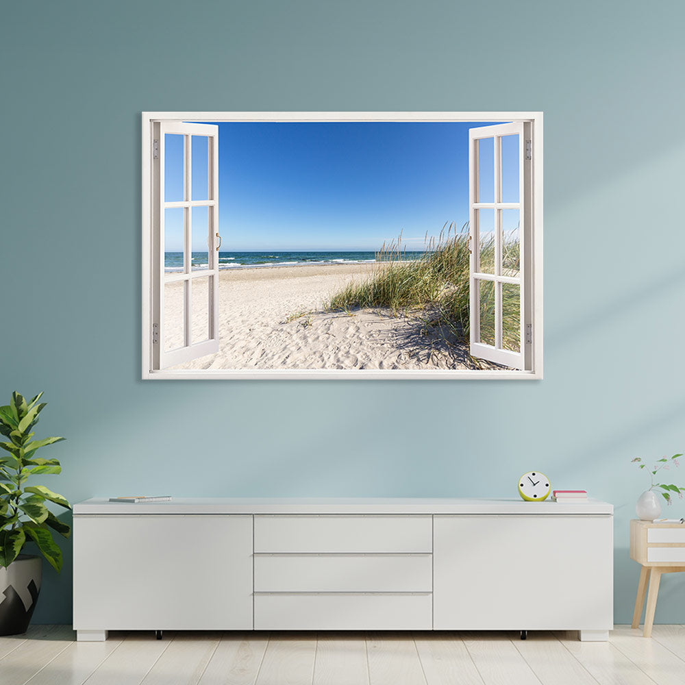 Leinwandbild Fensterblick "Ostsee Strand" an hellblauer Wand über Sideboard