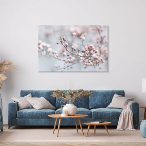 Leinwandbild "Kirschblüte" über blauem Sofa