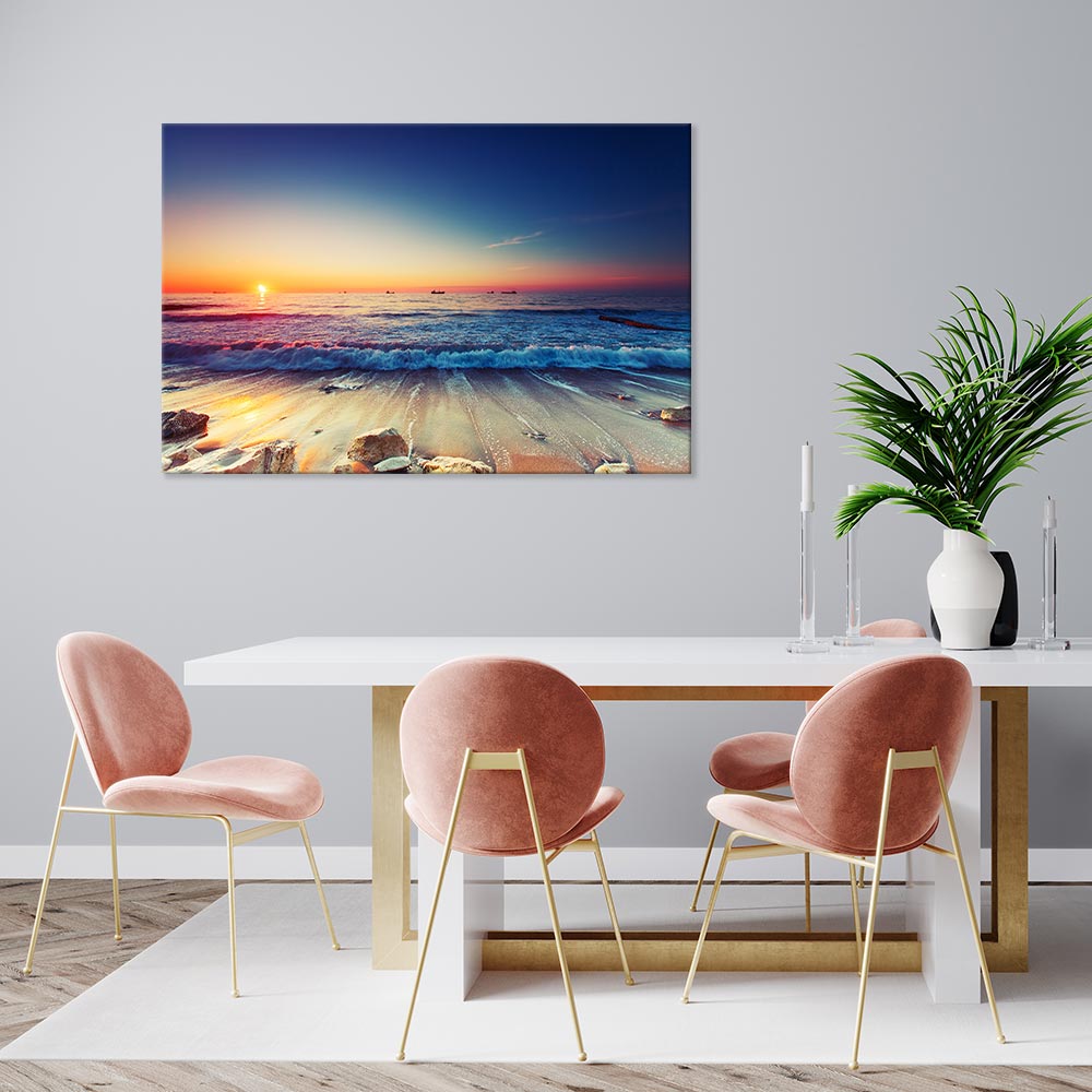 Canvasbild "Sonnenaufgang am Meer" über Esstisch